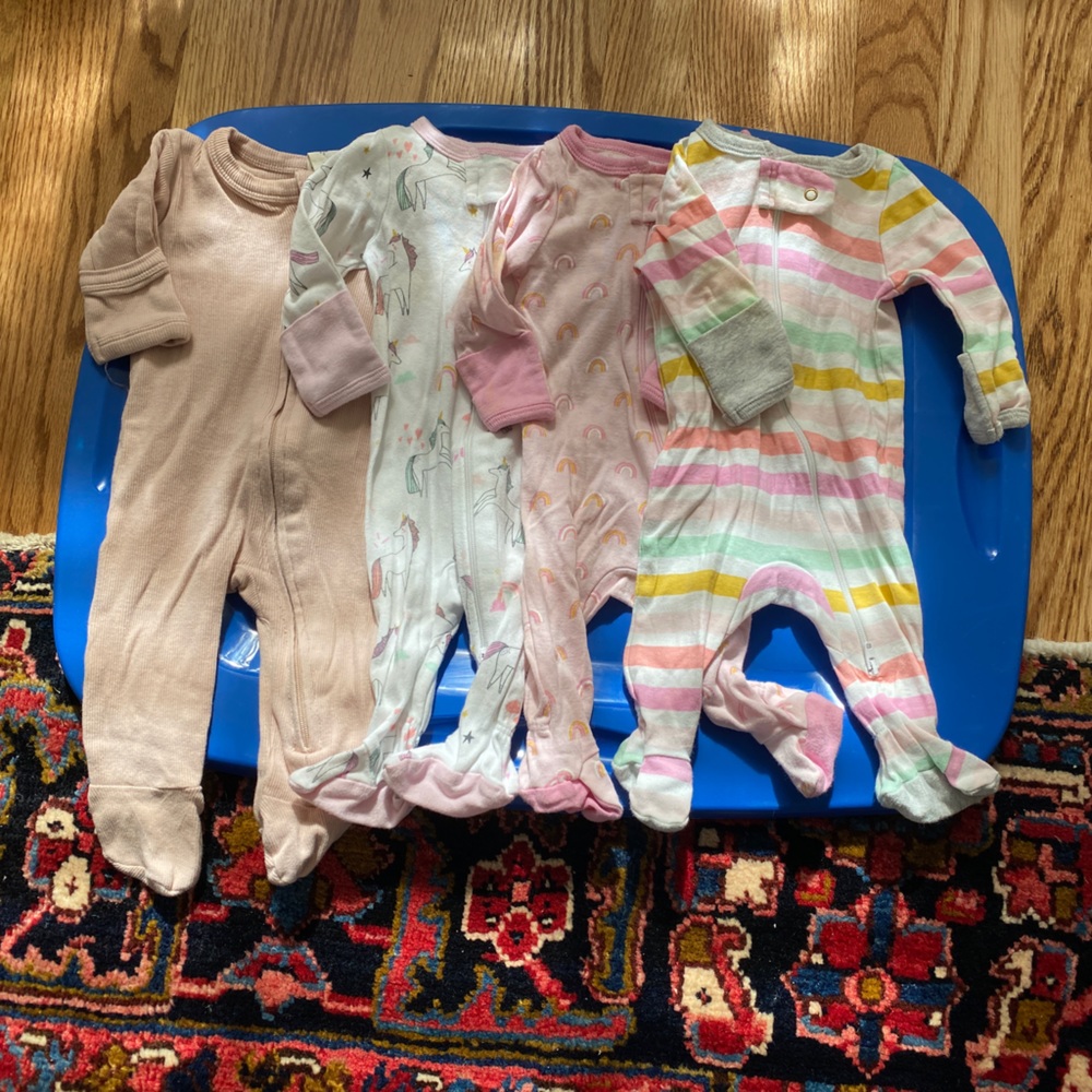 Bundle of 4 girls' newborn pajamas